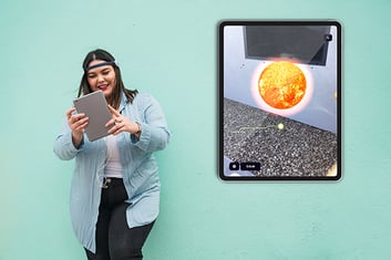 woman with BrainLink on ipad using Healium